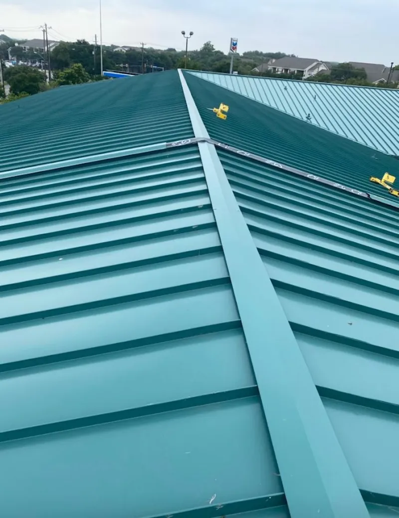 Green commercial metal roof ridge and valley for Metal Roof Repair in Redland